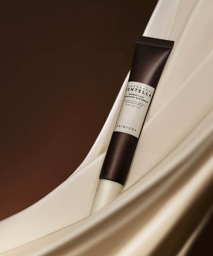 SKIN1004 Madagascar Centella Probio-cica Bakuchiol Eye Cream 20ml tube on a smooth surface