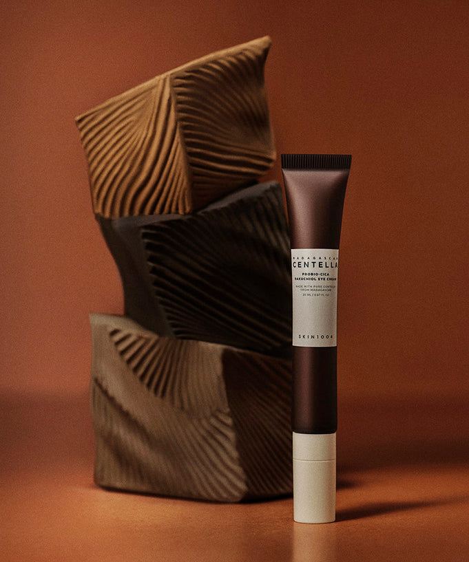 SKIN1004 Madagascar Centella Probio-cica Bakuchiol Eye Cream 20ml against artistic background