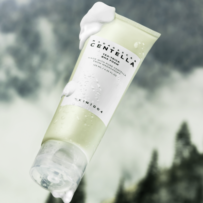 SKIN1004 Madagascar Centella Tea-trica BHA Foam 125ml product image with foaming texture and nature-inspired background.