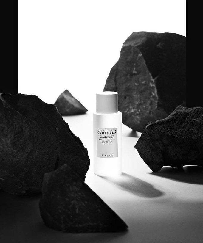 SKIN1004 Madagascar Centella Tone Brightening Boosting Toner 210ml among dark rocks