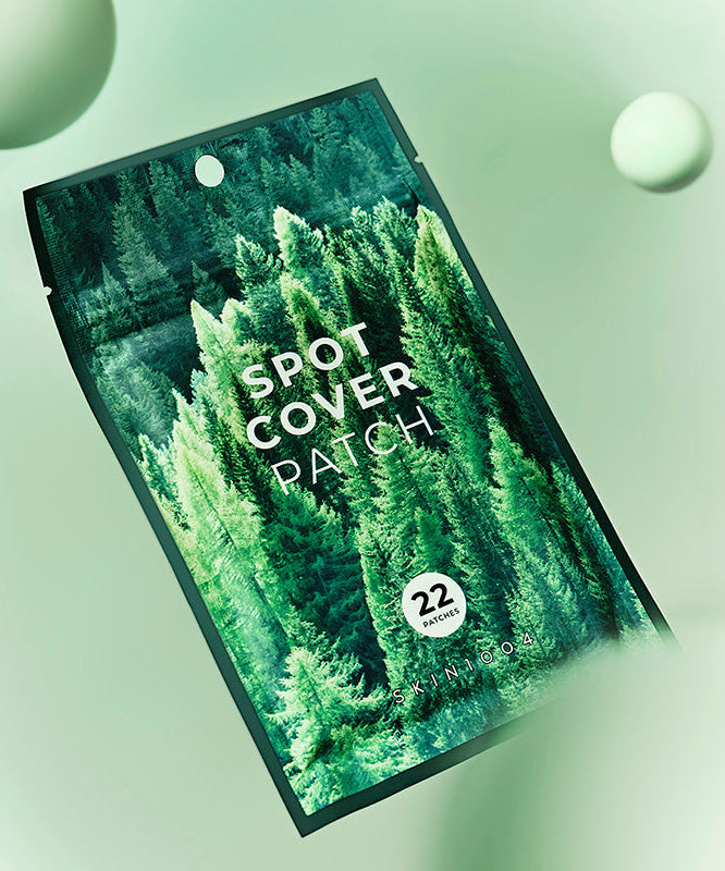 SKIN1004 Spot Cover Patch 22patch packaging design against green background.