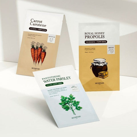 Collection of SKINFOOD face masks including Calming, Nourishing, Clear Mask, Carrot Carotene, Royal Honey Propolis, and Water Parsley.