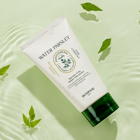 SKINFOOD Pantothenic Water Parsley Refresh Cleansing Foam 150ml on green background with parsley leaves