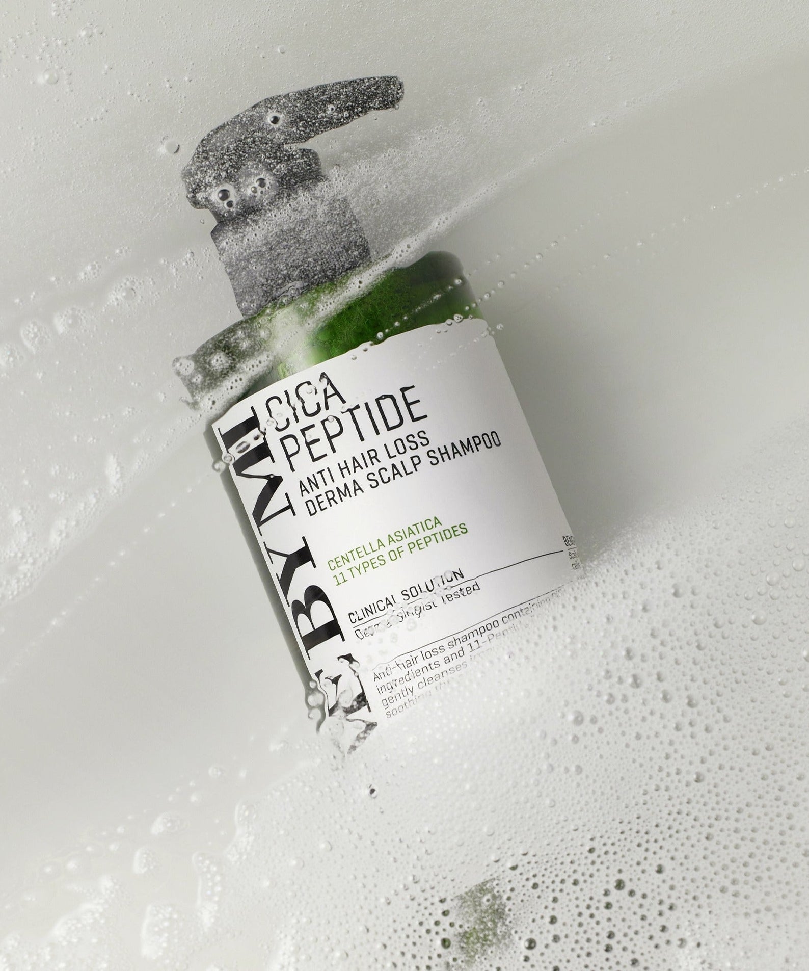 SOME BY MI Cica Peptide Anti Hair Loos Derma Scalp Shampoo 285ml in soapy water, focusing on hair care and scalp health.