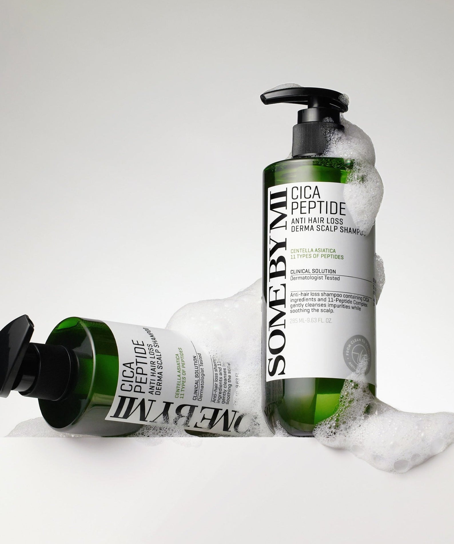 SOME BY MI Cica Peptide Anti Hair Loos Derma Scalp Shampoo 285ml bottles with foam, angled on a white background