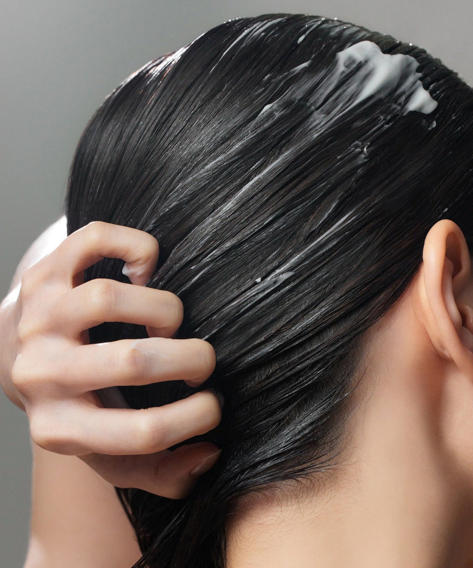 Application of SOME BY MI Cica Peptide Anti Hair Loss Derma Scalp Treatment 50ml for healthy scalp and hair care.