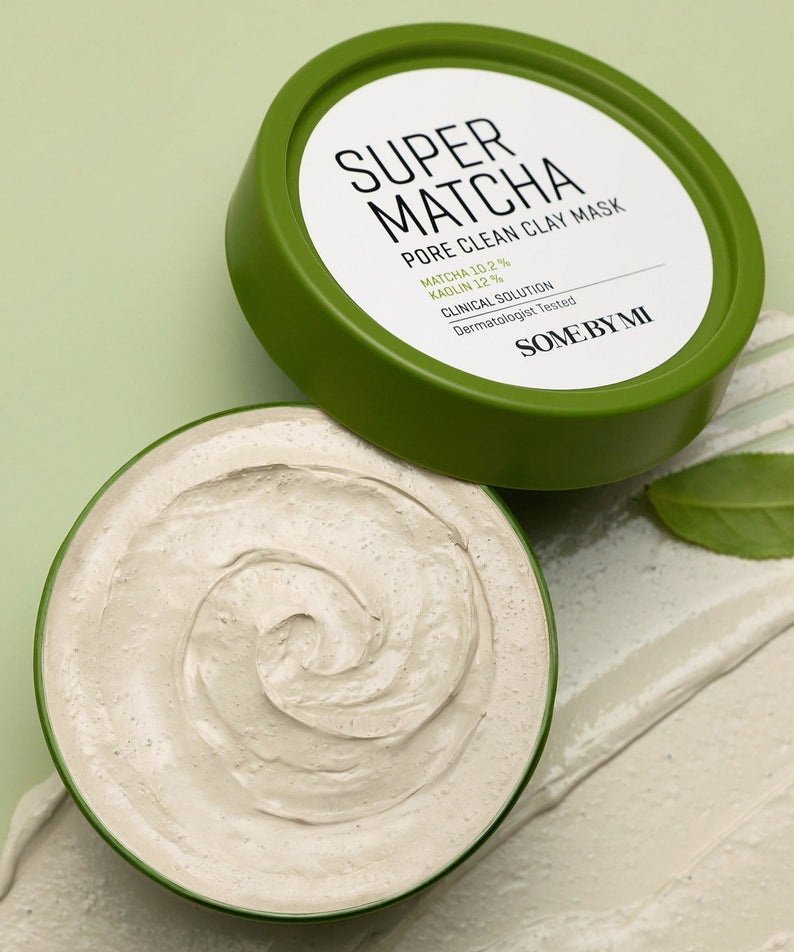 SOME BY MI Super Matcha Pore Clean Clay Mask 100g shown with open lid displaying creamy texture on a green background.