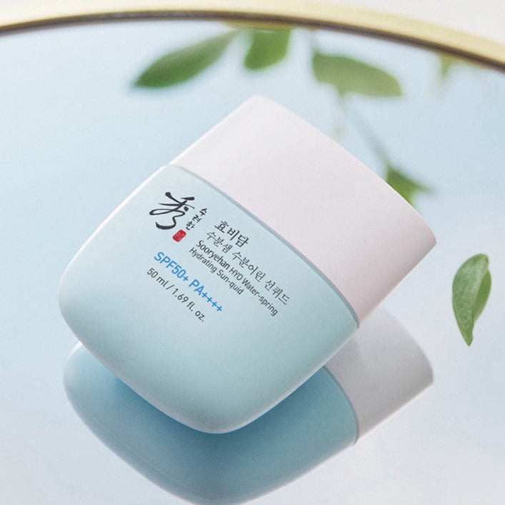 SOORYEHAN HYO Water-Spring Hydrating Sun-quid 50ml bottle on reflective surface