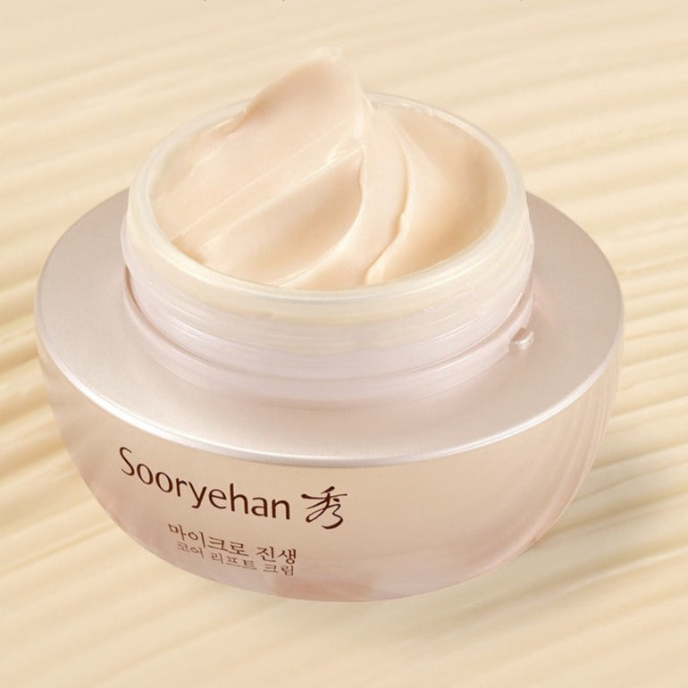 SOORYEHAN Micro Ginseng Core Lift Cream 30ml in an open jar with rich texture on a wooden surface.