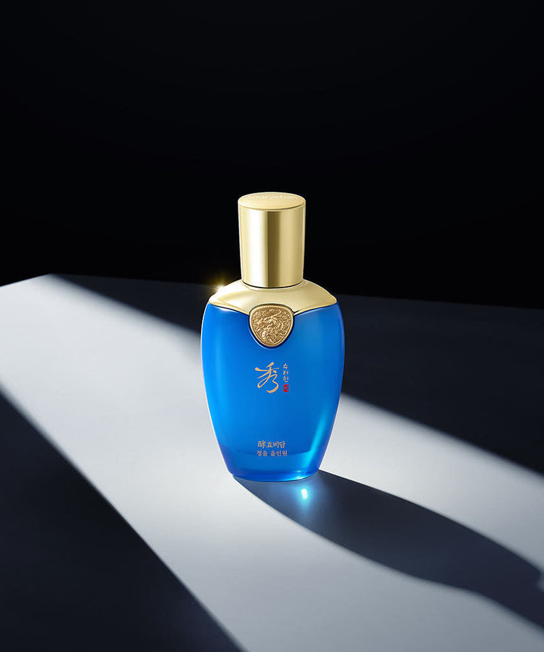 SOORYEHAN Hyobidam Jeongyul All-in-One 100ml blue bottle with gold cap on dark background, Gentleman Korea premium men's skincare product