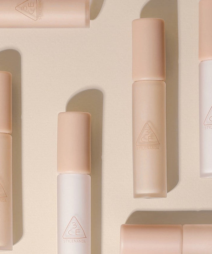 STYLE NANDA 3CE Skin Fit Cover Liquid Concealer bottles arranged on a neutral background showing product design and branding.