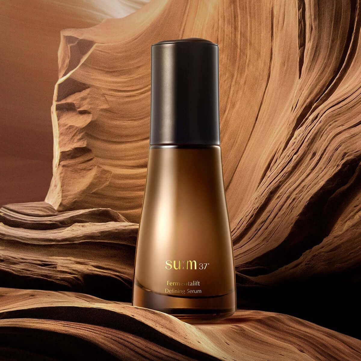 SU:M37 Fermentalift Defining Serum 50ml bottle with artistic background