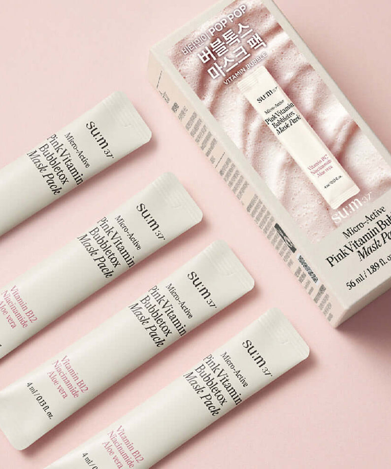 SU:M37 Microactive Pink Vitamin Bubble Tox Mask 4ml (14 sheet ) packaging and tubes on a pink background