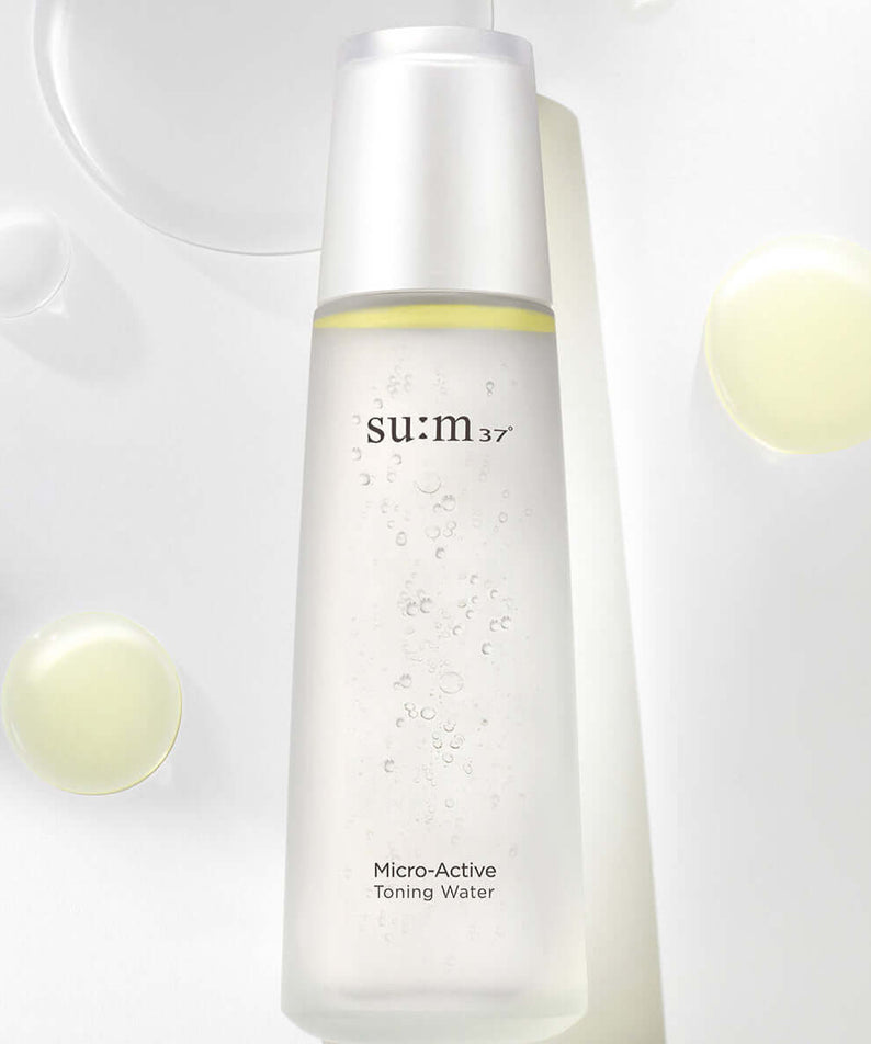 SU:M37 Microactive Toning Water 150ml bottle with clear liquid on light background.
