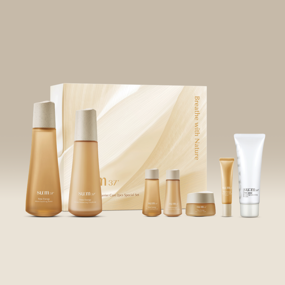 SU:M37 Time Energy Moist Soothing Barrier Care 2-piece set with bottles and tubes against beige background.