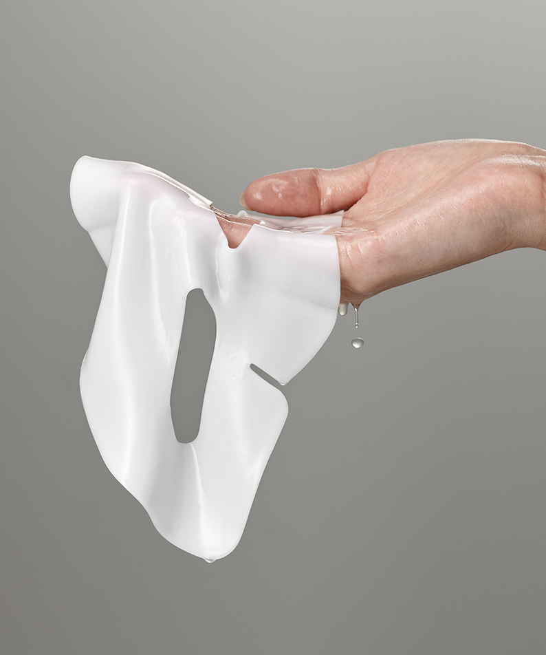 SUNGBOON EDITOR Deep Collagen Hyalu-B5 hydrating Mask being held in hand, showcasing its hydrating texture.