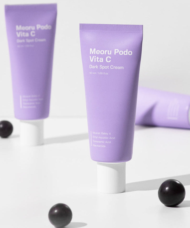 SUNGBOON EDITOR Meoru Podo Vita C Dark Spot Cream 50ml, anti-dark spot skincare product in purple tube packaging, on light background.