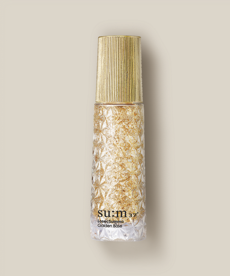Bottle of SU:M37 Rosicsumma Golden Base 30ml with golden lid and intricate design.