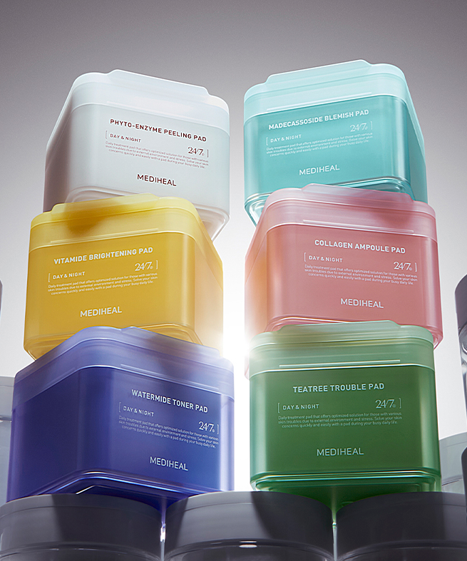 Stack of colorful MEDIHEAL Pad containers showcasing various skincare formulas.
