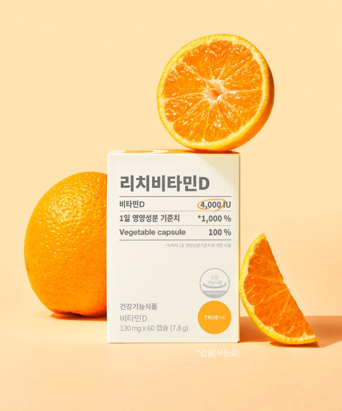 TRUE RX Rich Vitamin D supplement box with fresh oranges
