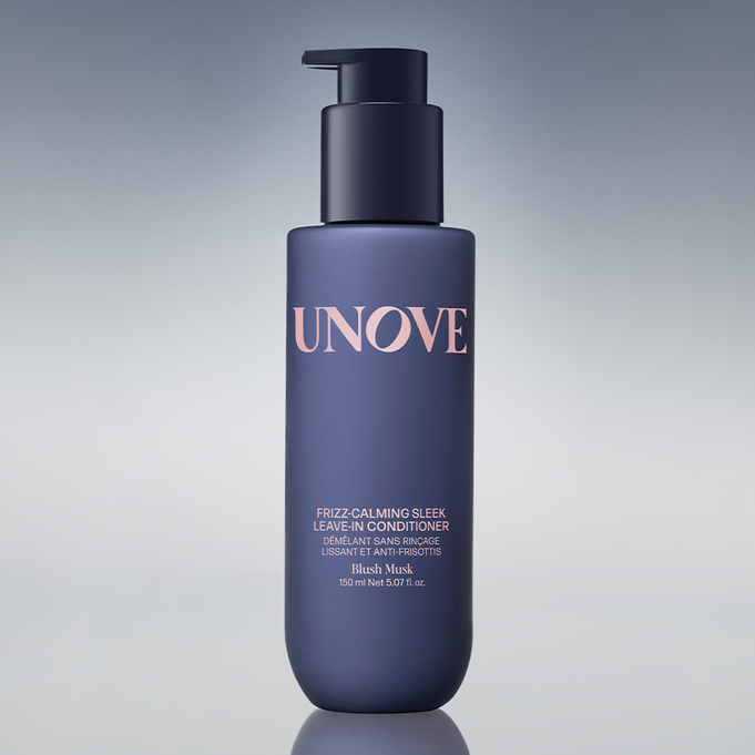 UNOVE Frizz Calming Sleek Leave-In Conditioner 150ml bottle on display.