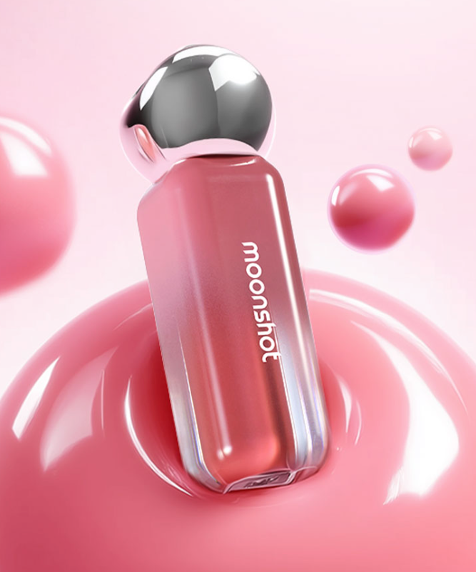 MOONSHOT Jelly Moon Glow Tint on pink glossy surface with bubbles