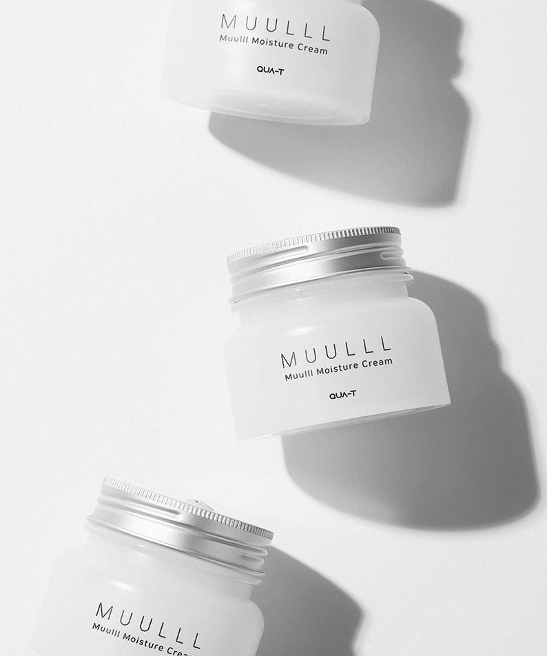 Three jars of QUA-T Subuji Moisture Cream 100ml, arranged artistically.