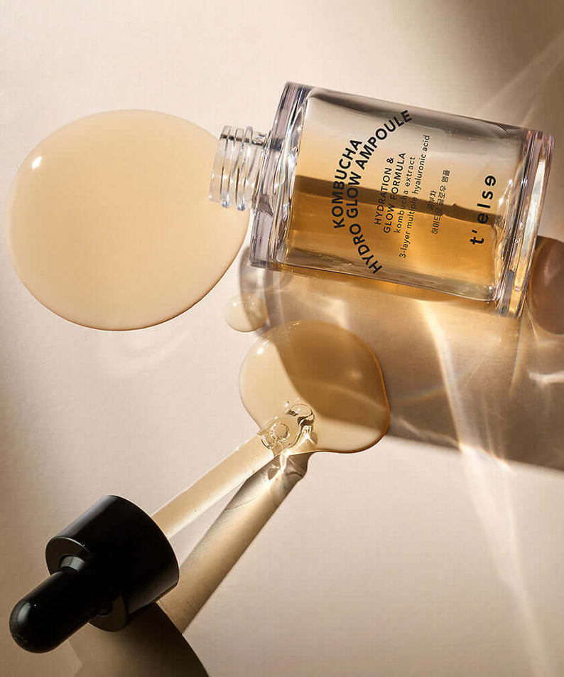 T'ELSE Kombucha Hydro Glow Ampoule 30ml bottle with dropper on a table.