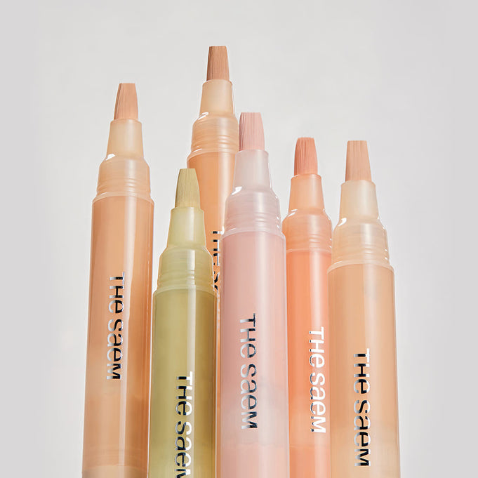 THE SAEM Cover Perfection Pen Concealer in various shades displayed vertically.