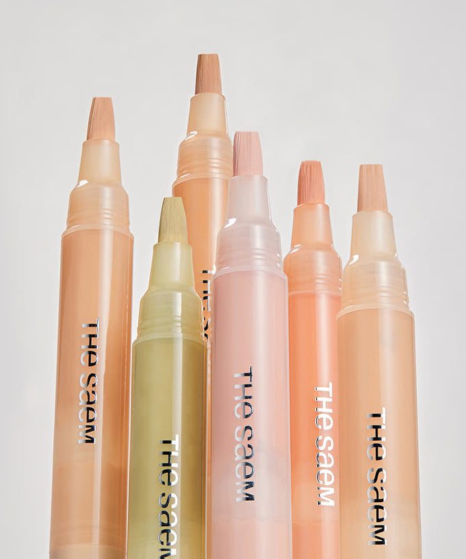 THE SAEM Cover Perfection Pen Concealer in various shades displayed vertically.