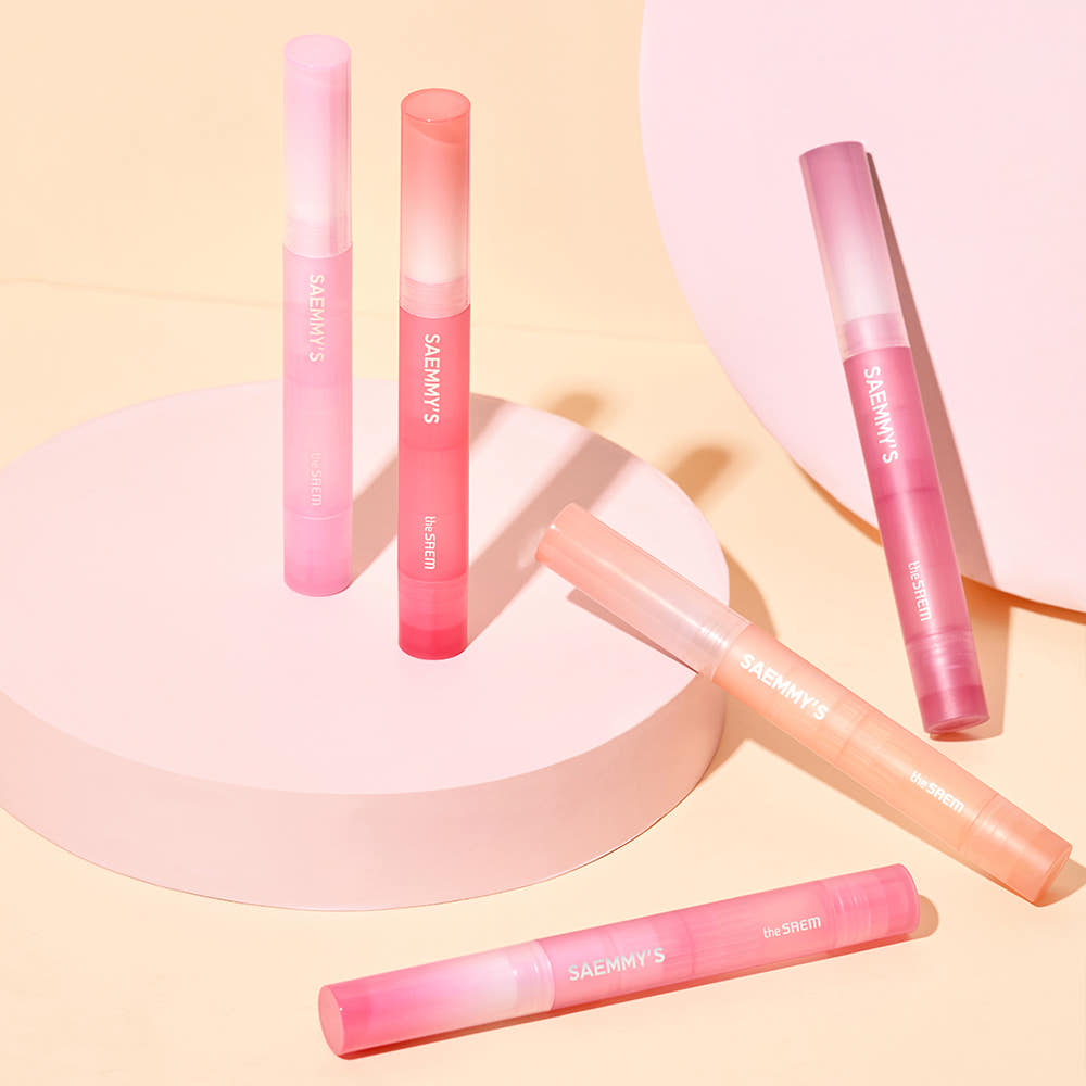THE SAEM Saemmy's Crema Velvet Lipstick collection displayed on pastel pink backdrop.