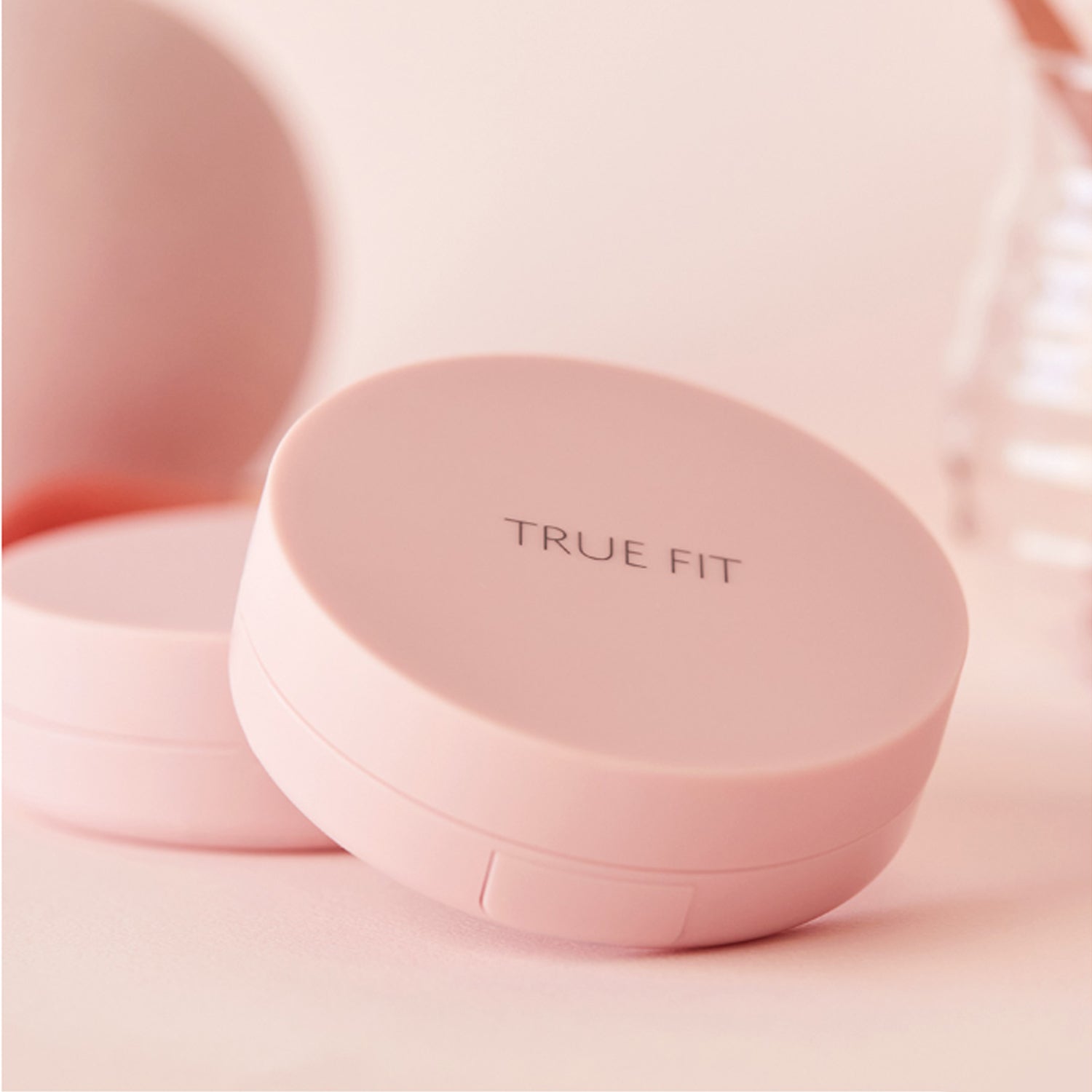 THE SAEM True Fit Glow Cushion in light pink packaging, showcasing the product's elegant design.