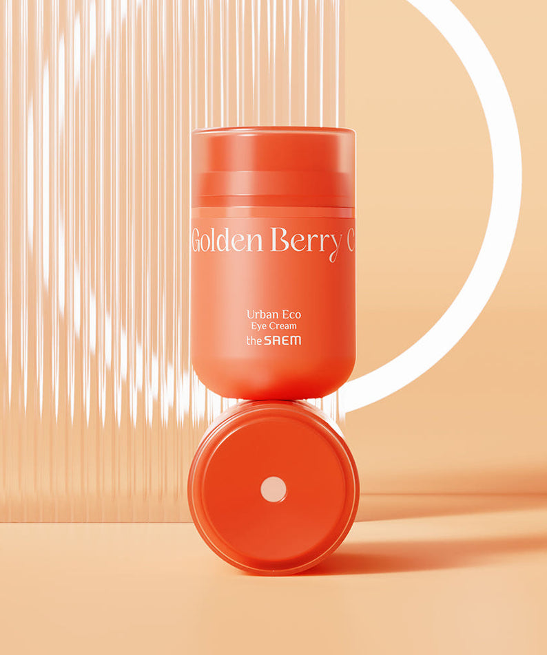 THE SAEM Urban Eco Golden Berry C Eye Cream 30ml displayed with an orange background