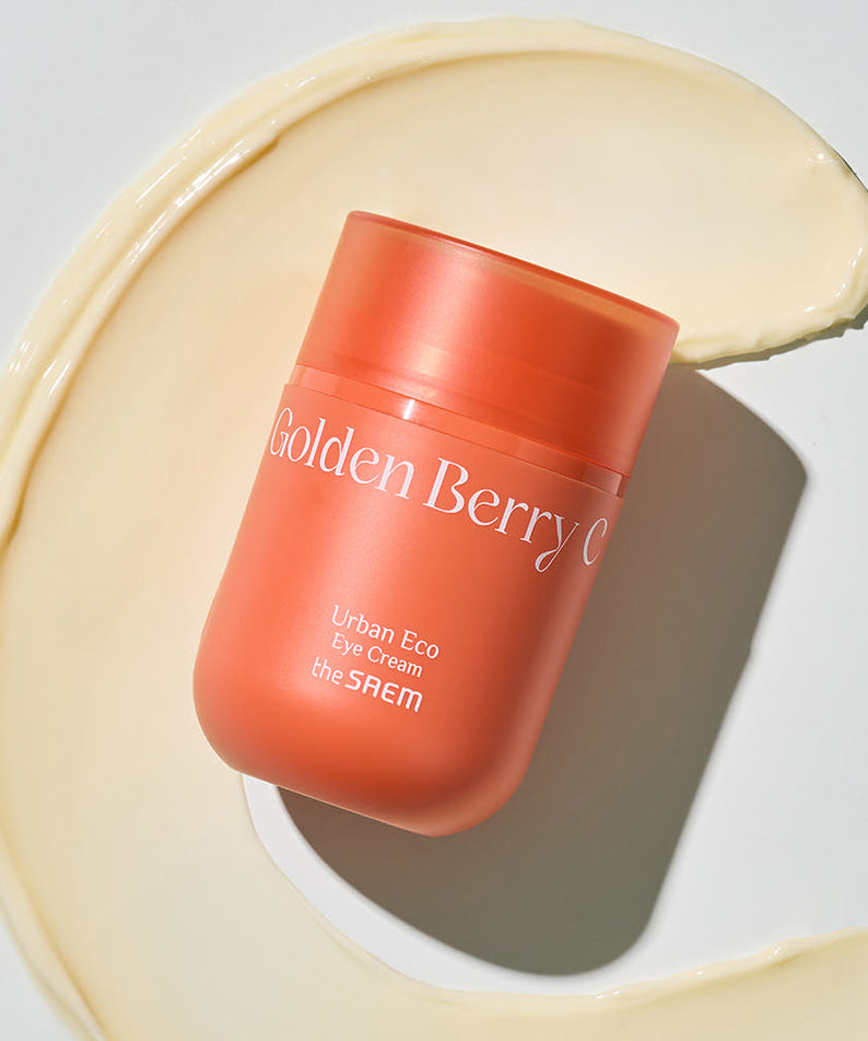 THE SAEM Urban Eco Golden Berry C Eye Cream 30ml jar on creamy background