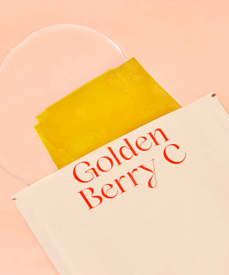THE SAEM Urban Eco Golden Berry C Mask Sheets 10 Sheets with packaging on a pink background
