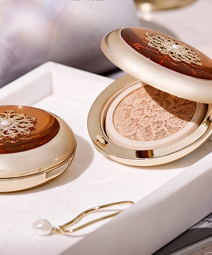 THE WHOO Cheongidan Hwahyun Essence Cushion 15g displayed elegantly in an open compact, showcasing luxurious gold packaging.