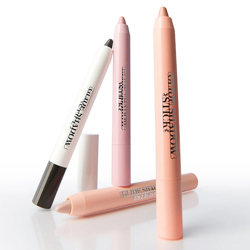 TIP TOE Glide Shadow Stick in various colors for eye makeup application.