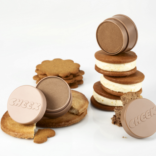 TONY MOLY Cheektone Jelly Blusher displayed with stacked cookies on a white background.