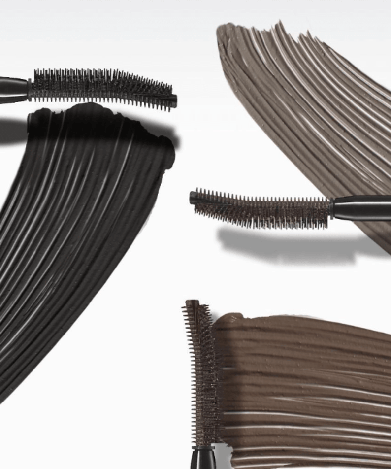 Close-up of TONY MOLY Eyetone Curl Correcting Mascara showing different brush styles and mascara shades.