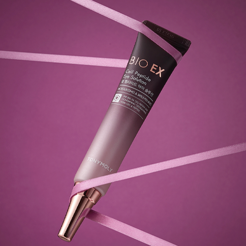 TONYMOLY Bio Ex Cell Peptide Isolation 30ml skincare serum displayed with pink ribbon on a purple background