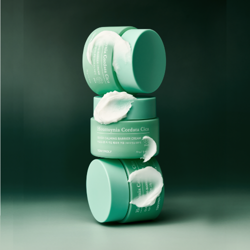 Stack of TONYMOLY Houttuynia Cordata Cica Quick Calming Barrier Cream 70g jars with cream texture, vibrant packaging highlighted.