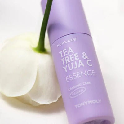 TONYMOLY Pure Tea Tree & Yuzu Seed Vitality Essence 50ml bottle with flower