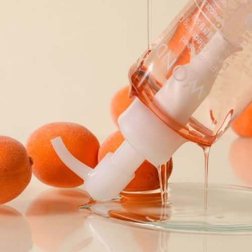 TONYMOLY Wonder Apricot Deep Cleansing Oil 190ml bottle with apricots in background, showcasing the product's texture and packaging.