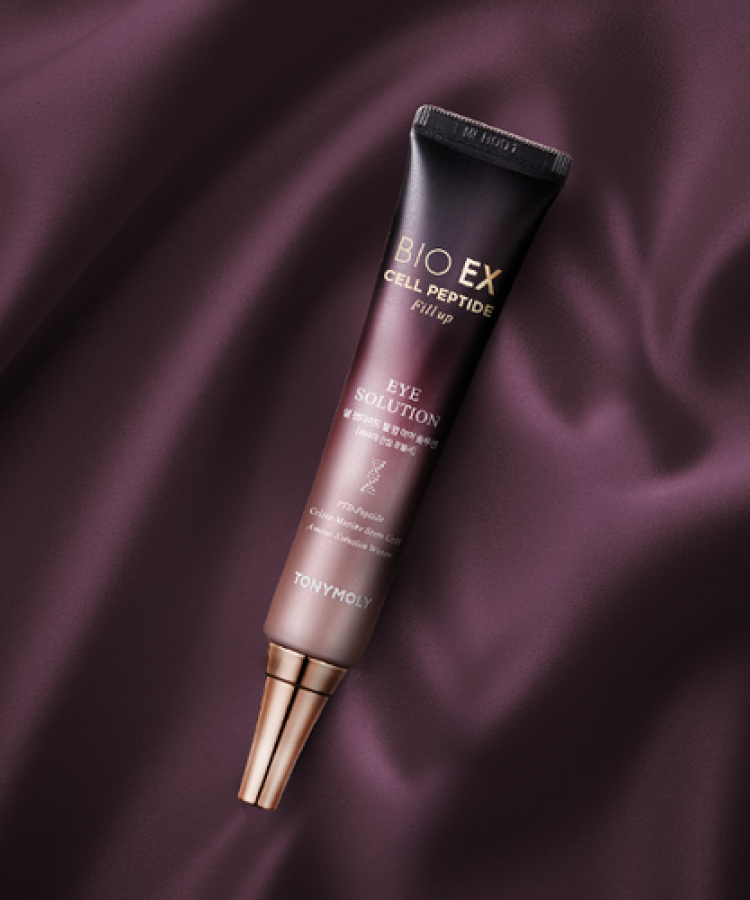 TONYMOLY Bio Ex Cell Peptide Isolation 30ml bottle on a soft fabric background