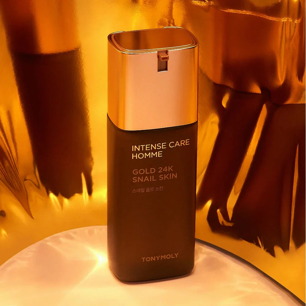 TONYMOLY Intense Care Gold 24K Snail Homme Skin 130ml - Gentleman Korea premium men's skincare bottle on gold background