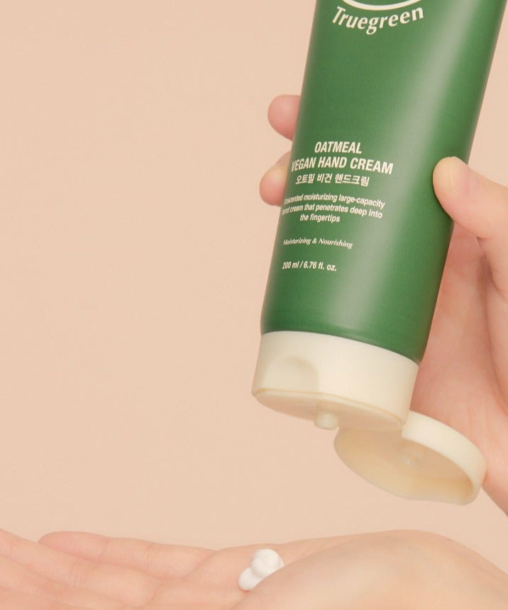 Applying TONYMOLY Truegreen Oatmeal Vegan Hand Cream 200ml to hand.