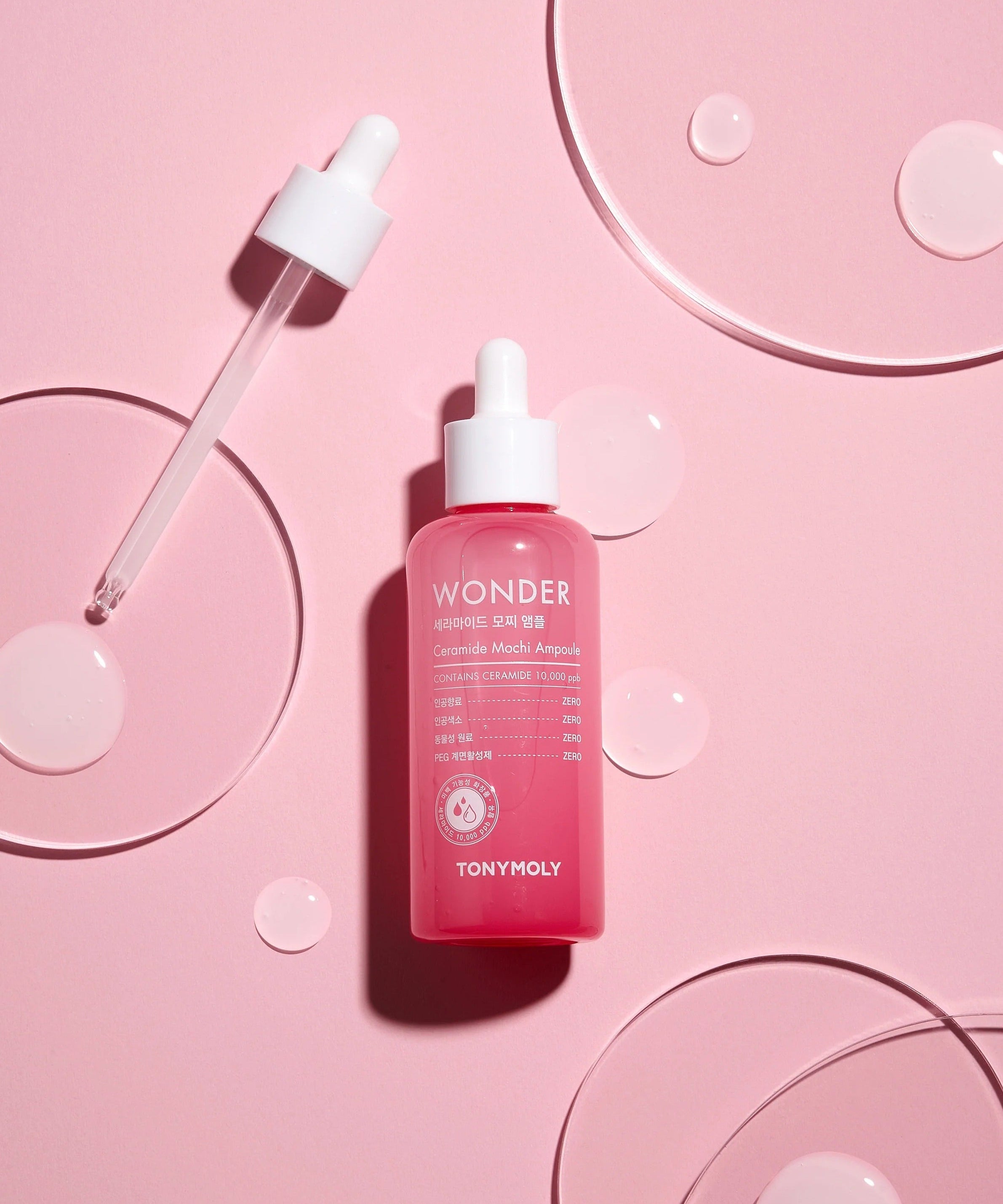 TONYMOLY Wonder Ceramide Mochi Ampoule 100ml pink bottle with dropper on pink background