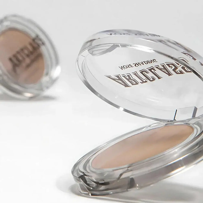 TOO COOL FOR SCHOOL By Rodin Nose Shading compact with open lid showing shade detail.