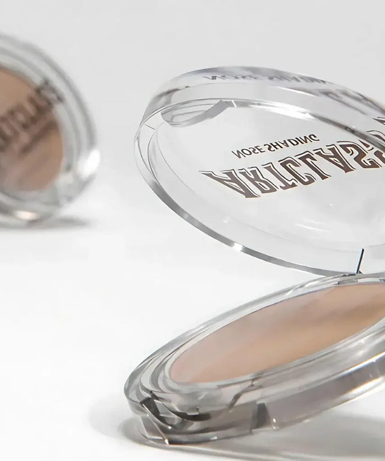 TOO COOL FOR SCHOOL By Rodin Nose Shading compact with open lid showing shade detail.