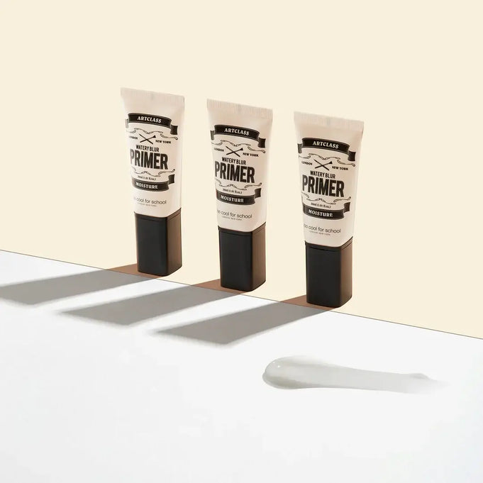 TOO COOL FOR SCHOOL Watery Blur primer tubes with cream on beige background